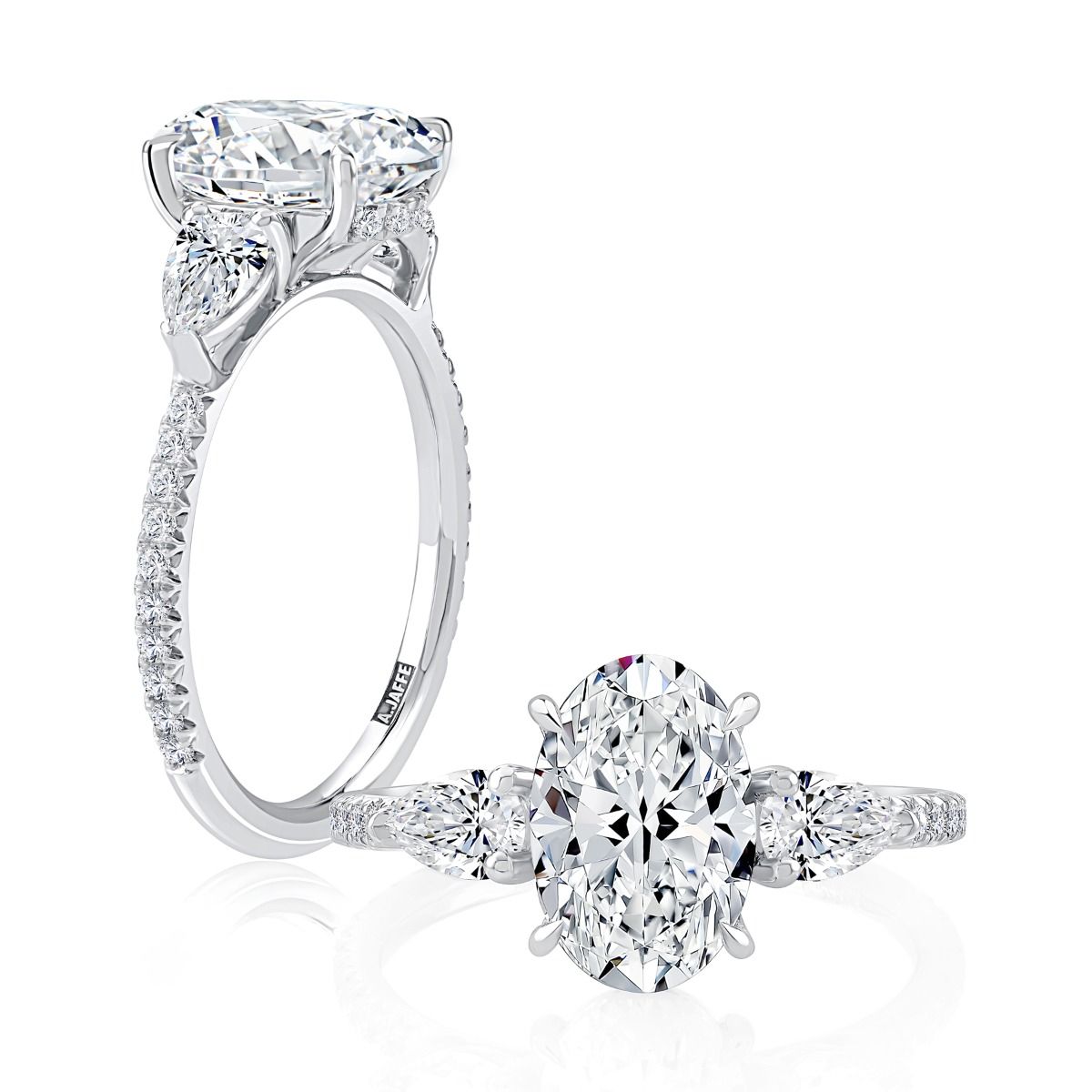 Three Stone Oval Cut Diamond Engagement Ring With East West Pear Diamonds And Diamond Pave Band, photograph 4