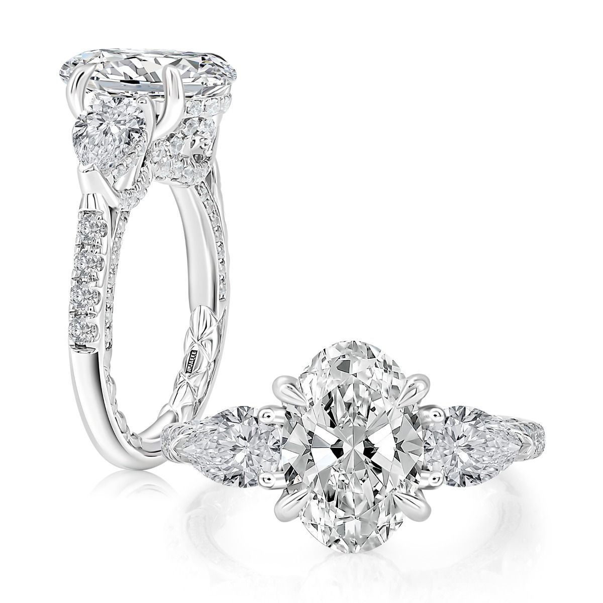Oval Diamond Three-Stone Engagement Ring with Pear Side Stones