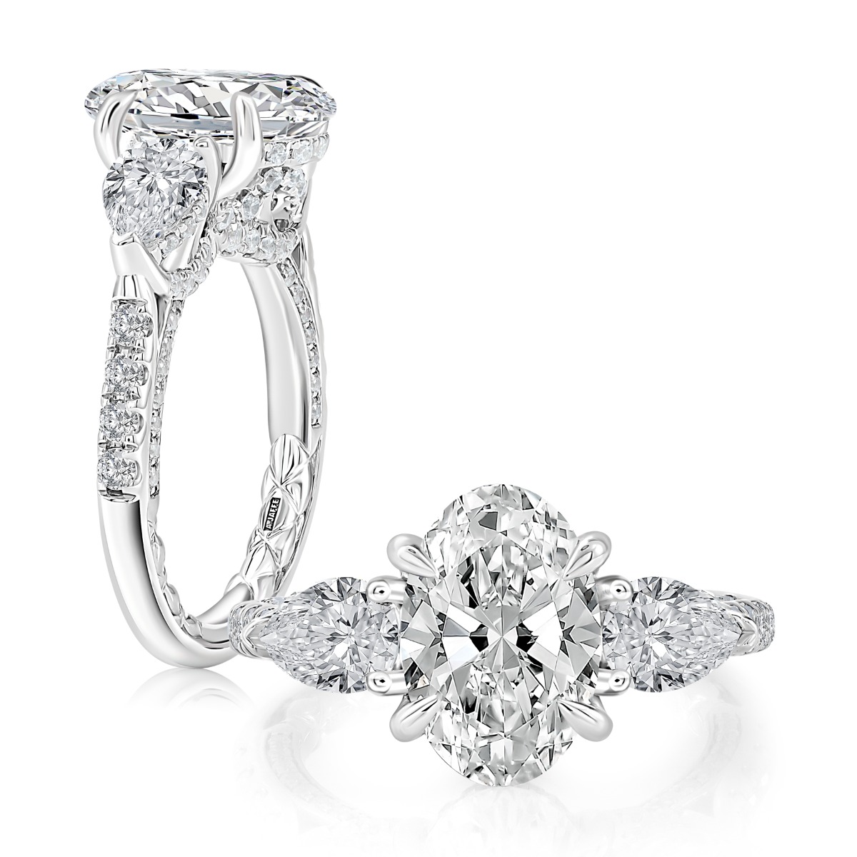 Oval Diamond Three-Stone Engagement Ring with Pear Side Stones